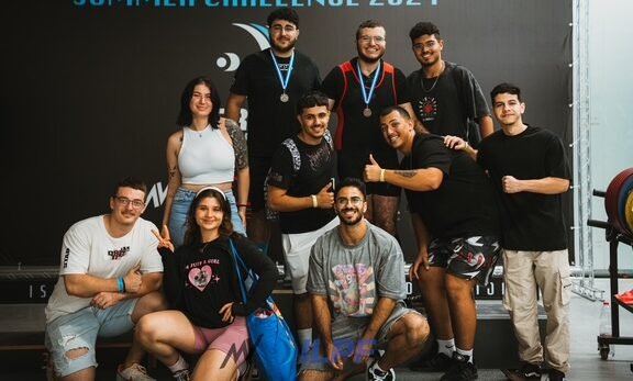 Kaizen Strength Systems team posing after competition event